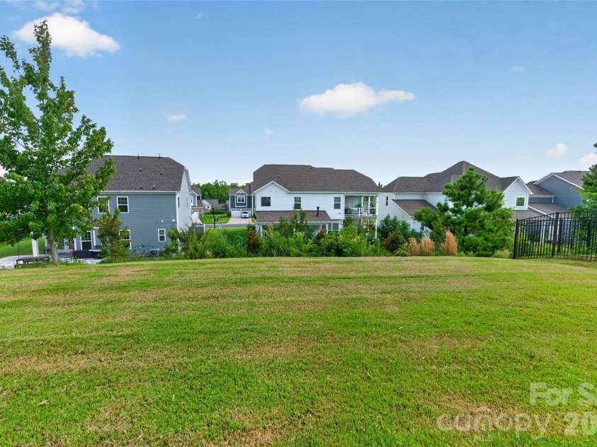 2249 Idol Rock Drive, Fort Mill, SC 29707.  MLS# CAR4396380, YatesRealty ID 33582. Backyard views from patio