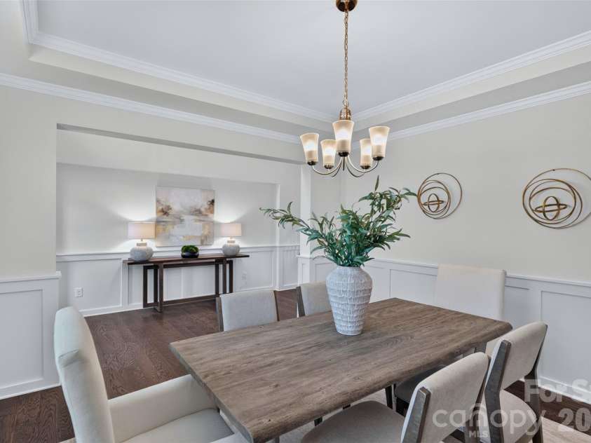 2249 Idol Rock Drive, Fort Mill, SC 29707.  MLS# CAR4396380, YatesRealty ID 33582. Formal dining room with tray ceiling with lovely trim work