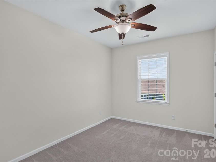 2249 Idol Rock Drive, Fort Mill, SC 29707.  MLS# CAR4396380, YatesRealty ID 33582. Second floor bedroom