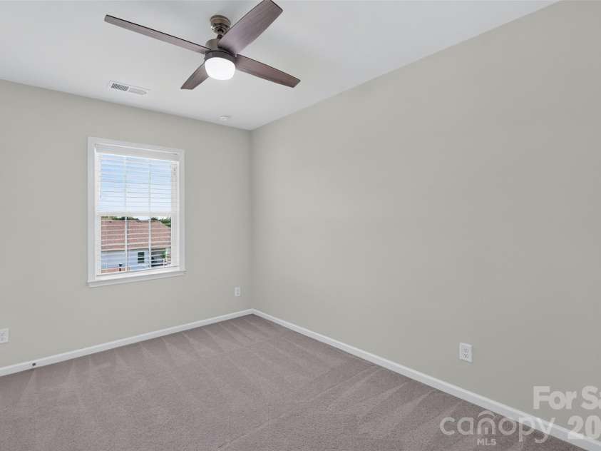 2249 Idol Rock Drive, Fort Mill, SC 29707.  MLS# CAR4396380, YatesRealty ID 33582. Third bedroom on the upper level