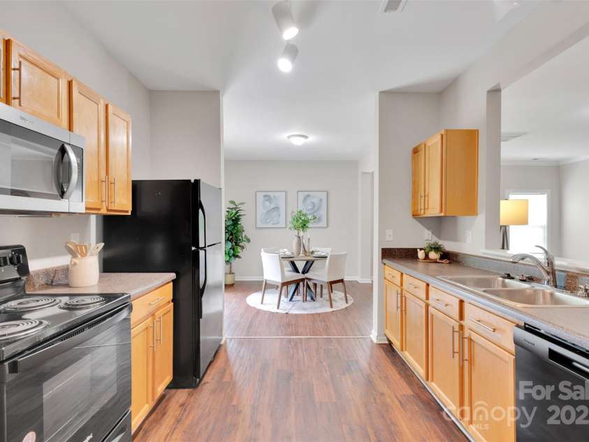 4323 Leopold Place, Charlotte, NC 28215.  MLS# CAR4294145, YatesRealty ID 33587. Kitchen - Black Appliance Package