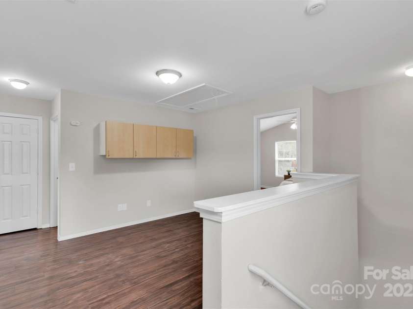 4323 Leopold Place, Charlotte, NC 28215.  MLS# CAR4294145, YatesRealty ID 33587. LOFT - Custom Cabinets