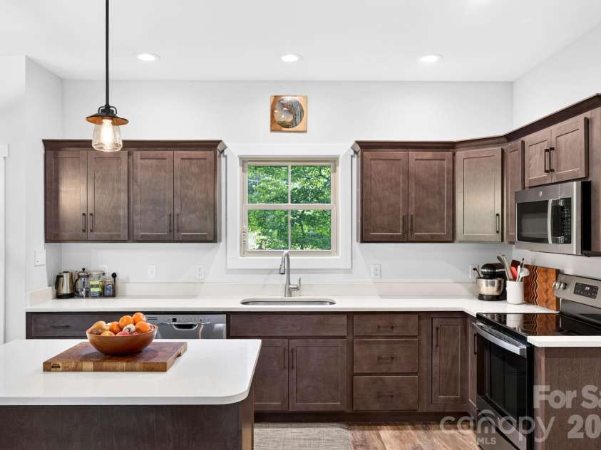 58 Shuler Road, Candler, NC 28715.  MLS# CAR4396934, YatesRealty ID 33589. Eat-In Kitchen with Island