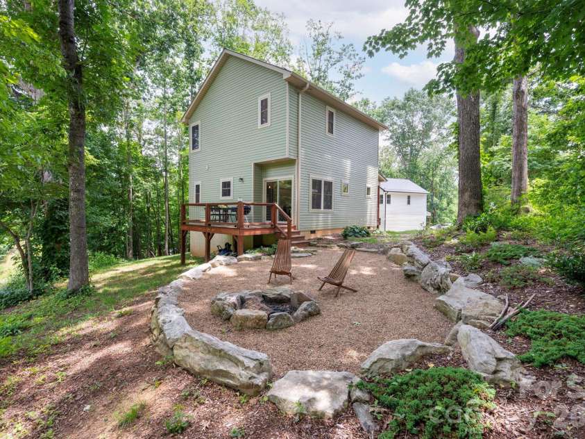 58 Shuler Road, Candler, NC 28715.  MLS# CAR4396934, YatesRealty ID 33589. Fantastic Fire Pit Area