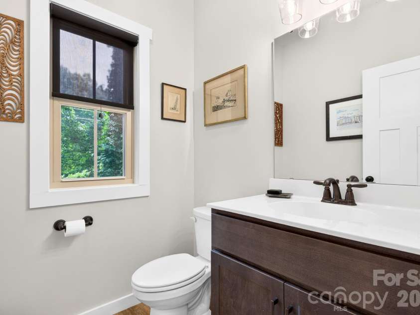 58 Shuler Road, Candler, NC 28715.  MLS# CAR4396934, YatesRealty ID 33589. Half Bath on Main