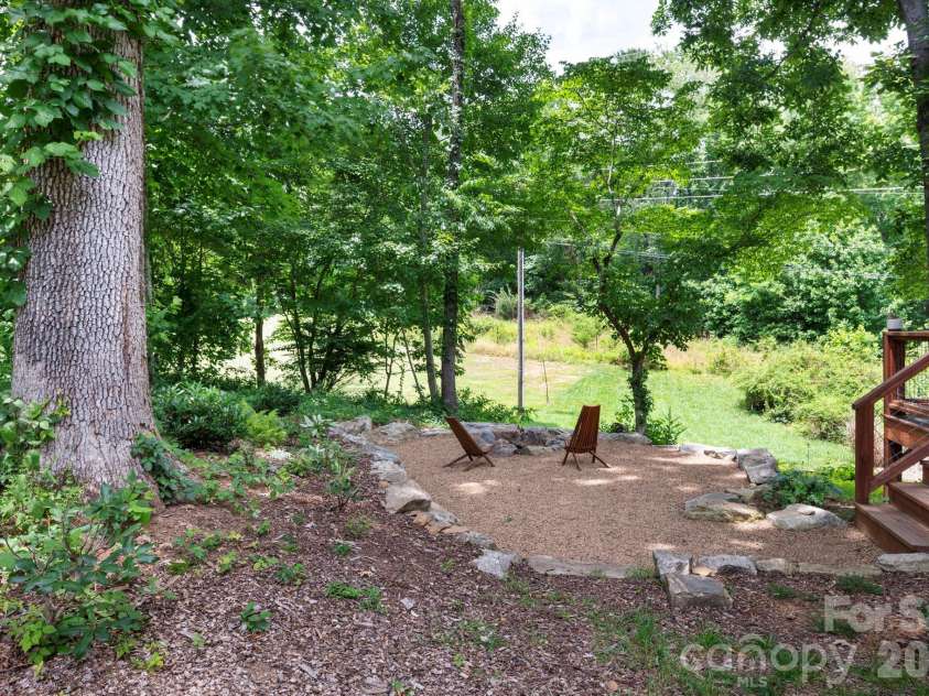 58 Shuler Road, Candler, NC 28715.  MLS# CAR4396934, YatesRealty ID 33589. Total Privacy in Backyard