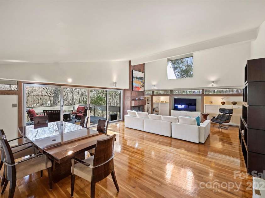 6366 Sharon Hills Road, Charlotte, NC 28210.  MLS# CAR4228866, YatesRealty ID 3359. Dining room flows into living room