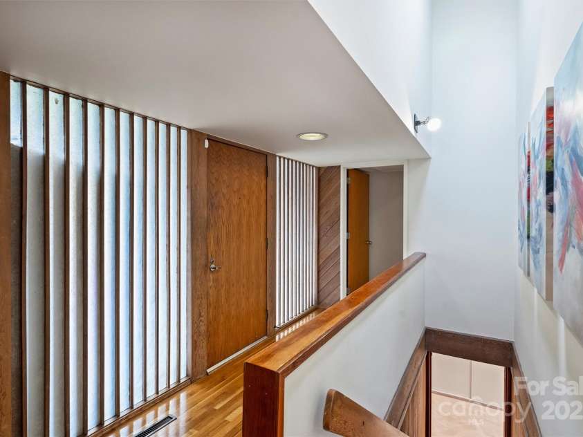 6366 Sharon Hills Road, Charlotte, NC 28210.  MLS# CAR4228866, YatesRealty ID 3359. Foyer and stairs to lower level