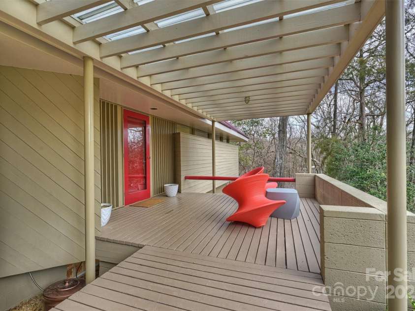 6366 Sharon Hills Road, Charlotte, NC 28210.  MLS# CAR4228866, YatesRealty ID 3359. Front deck with uplighting