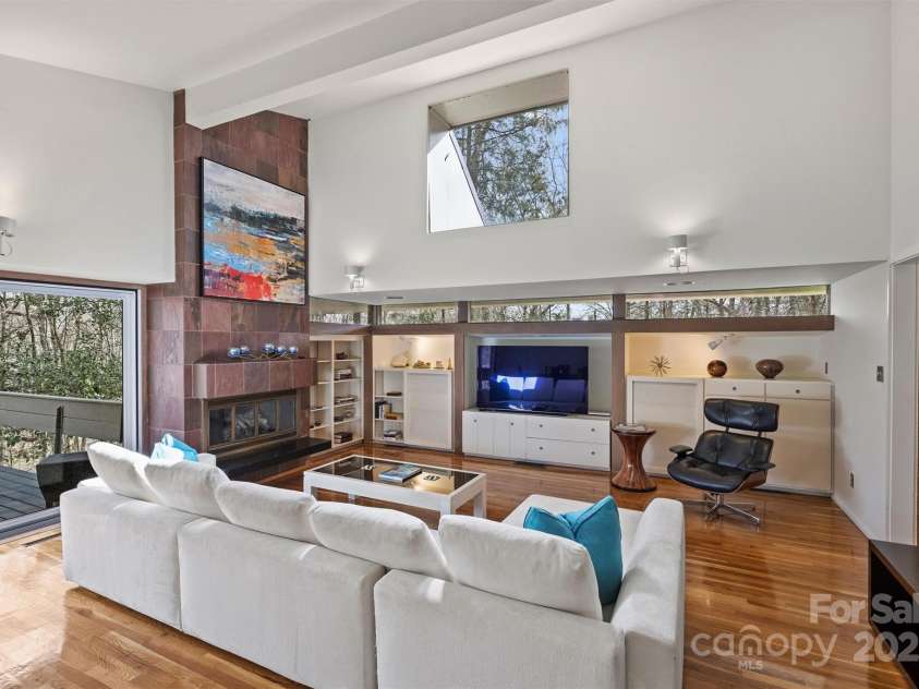 6366 Sharon Hills Road, Charlotte, NC 28210.  MLS# CAR4228866, YatesRealty ID 3359. Living room with built-in bookcases