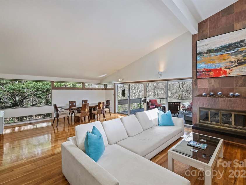 6366 Sharon Hills Road, Charlotte, NC 28210.  MLS# CAR4228866, YatesRealty ID 3359. Living room with fireplace