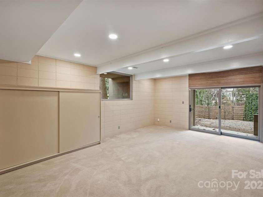 6366 Sharon Hills Road, Charlotte, NC 28210.  MLS# CAR4228866, YatesRealty ID 3359. Lower level den