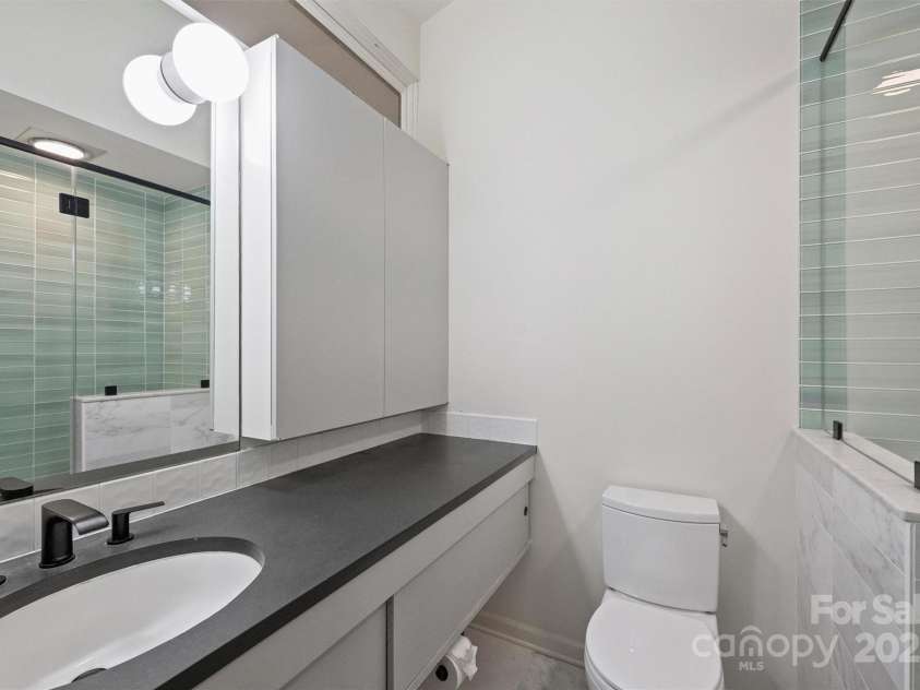 6366 Sharon Hills Road, Charlotte, NC 28210.  MLS# CAR4228866, YatesRealty ID 3359. Primary full bathroom