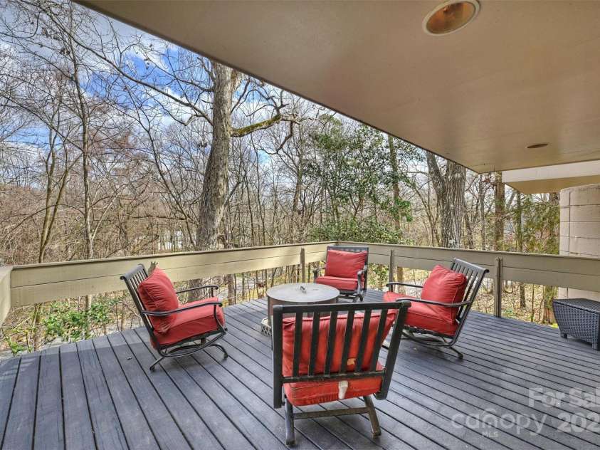6366 Sharon Hills Road, Charlotte, NC 28210.  MLS# CAR4228866, YatesRealty ID 3359. The cantilevered deck at the highest point of the lot exemplifies the design philosophy