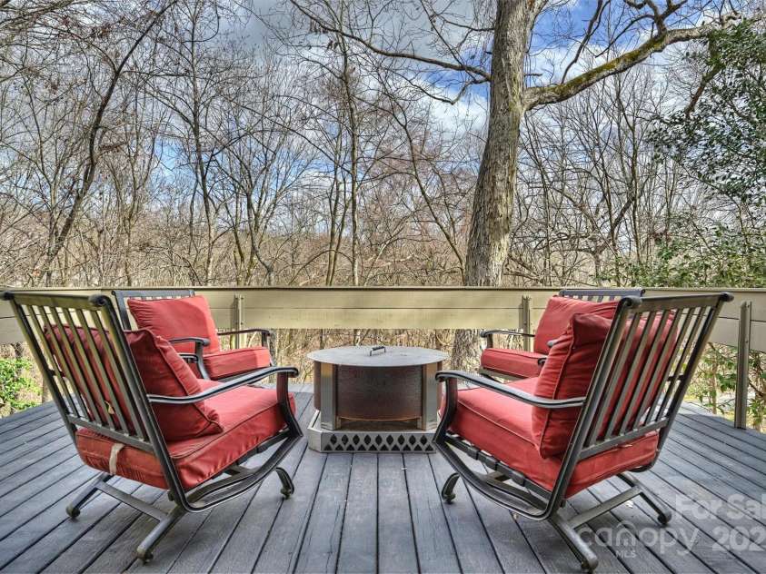 6366 Sharon Hills Road, Charlotte, NC 28210.  MLS# CAR4228866, YatesRealty ID 3359. The cantilevered deck at the highest point of the lot exemplifies the design philosophy