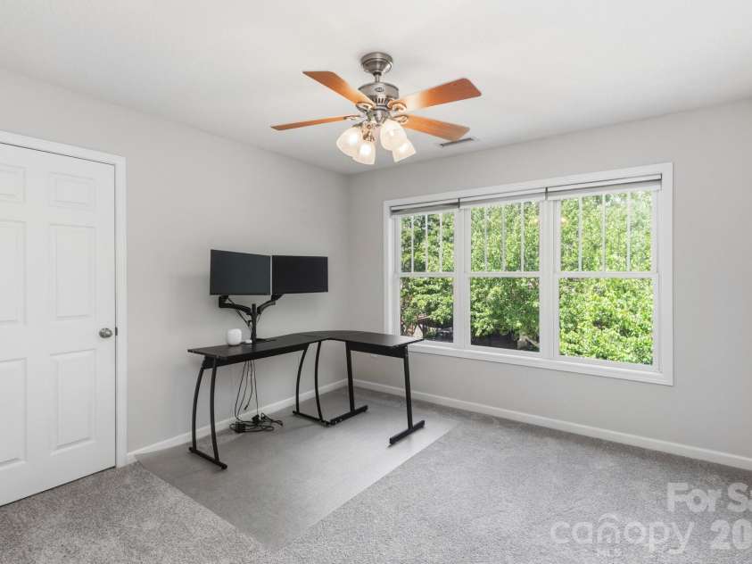 13 Triple H Drive, Asheville, NC 28806.  MLS# CAR4396514, YatesRealty ID 33591. Bedroom with Ceiling Fan