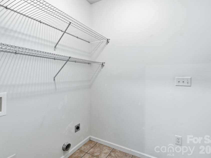13 Triple H Drive, Asheville, NC 28806.  MLS# CAR4396514, YatesRealty ID 33591. Laundry Room On Main Level