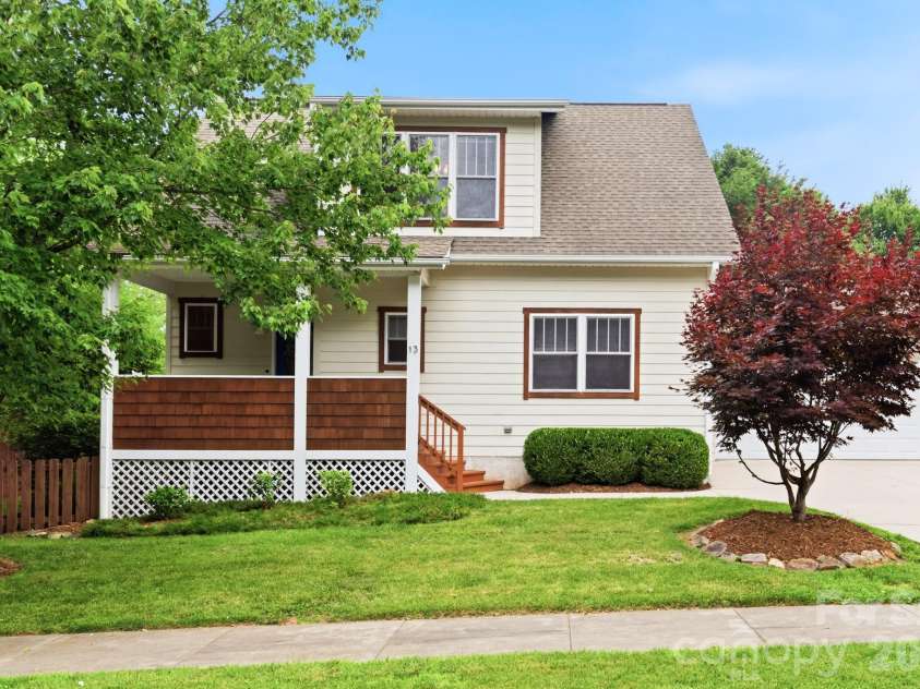 13 Triple H Drive, Asheville, NC 28806.  MLS# CAR4396514, YatesRealty ID 33591. Mature Landscaping Frames Peaceful Setting
