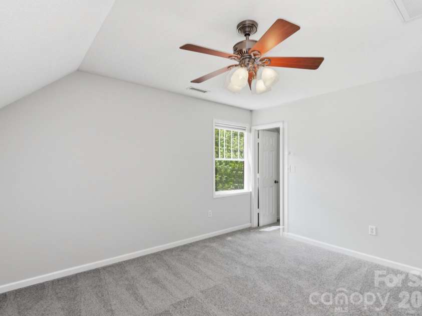 13 Triple H Drive, Asheville, NC 28806.  MLS# CAR4396514, YatesRealty ID 33591. Second-Level Bedroom with Walk-In Closet