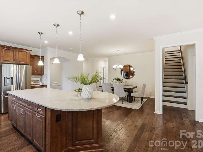 2336 Delaney Drive, Fort Mill, SC 29715.  MLS# CAR4390097, YatesRealty ID 33595. Kitchen, dining and stairway