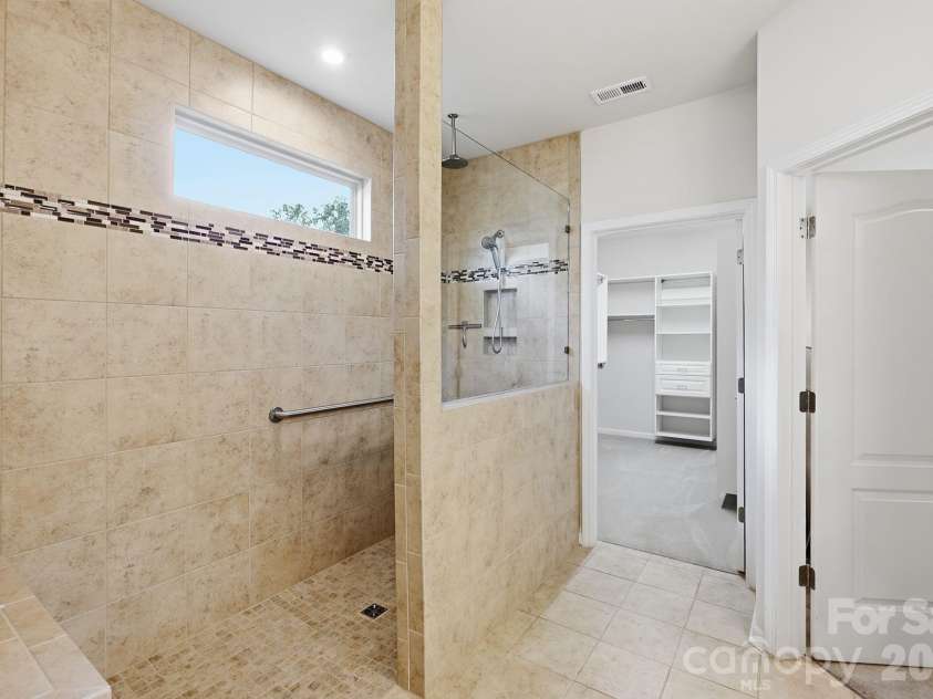 2336 Delaney Drive, Fort Mill, SC 29715.  MLS# CAR4390097, YatesRealty ID 33595. Primary suite shower-handicap accessible