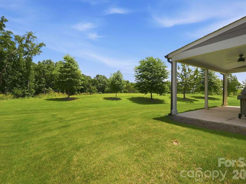 2336 Delaney Drive, Fort Mill, SC 29715.  MLS# CAR4390097, YatesRealty ID 33595. View from backyard