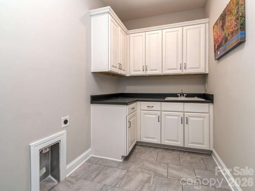 121 Enclave Boulevard, Weddington, NC 28104.  MLS# CAR4395615, YatesRealty ID 33597. 2nd floor laundry
