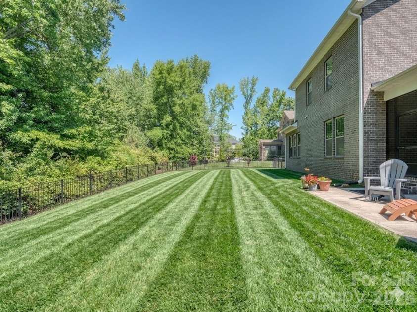 121 Enclave Boulevard, Weddington, NC 28104.  MLS# CAR4395615, YatesRealty ID 33597. Backyard