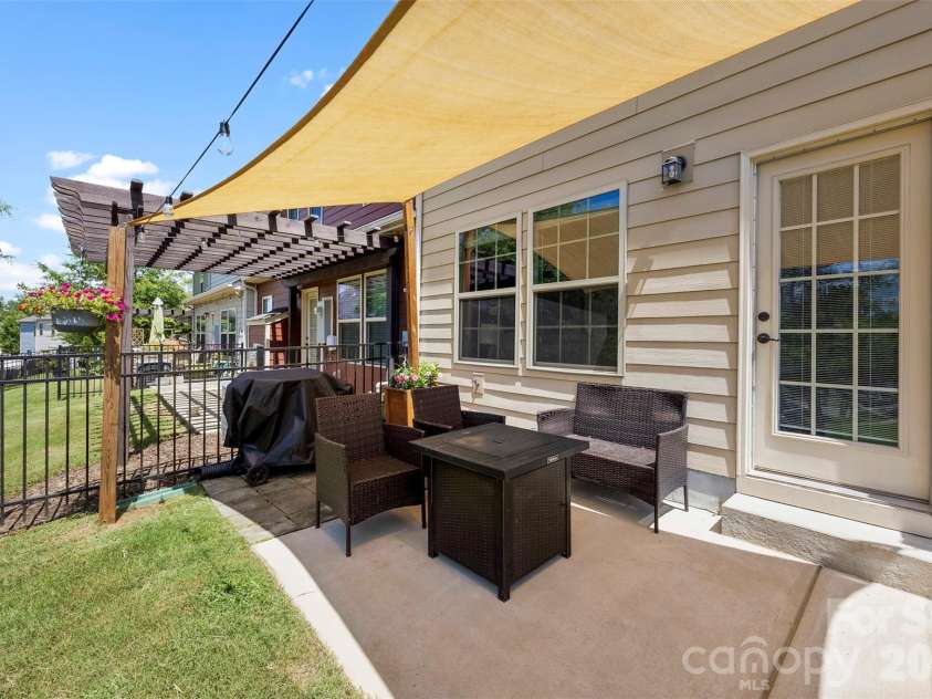 3216 Morgan Clark Road, Charlotte, NC 28208.  MLS# CAR4393148, YatesRealty ID 33598. Canopy covered Patio