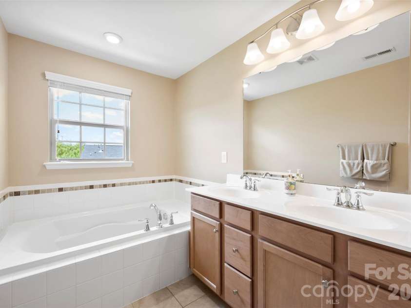 3216 Morgan Clark Road, Charlotte, NC 28208.  MLS# CAR4393148, YatesRealty ID 33598. Primary Bathroom