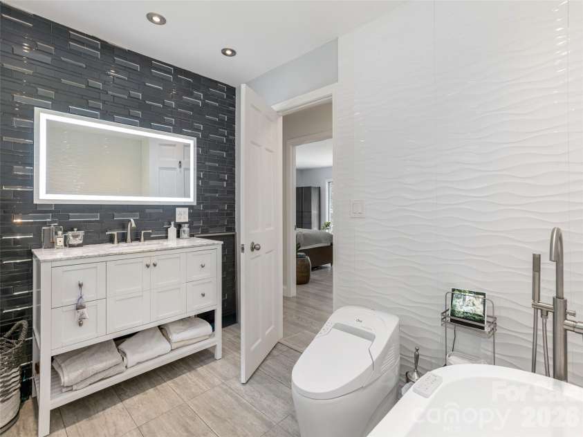 30 Fairway Drive, Etowah, NC 28729.  MLS# CAR4342625, YatesRealty ID 3360. Bathroom 2 with luxury tub and finishes