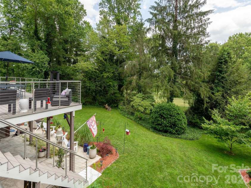 30 Fairway Drive, Etowah, NC 28729.  MLS# CAR4342625, YatesRealty ID 3360. Beautiful yard