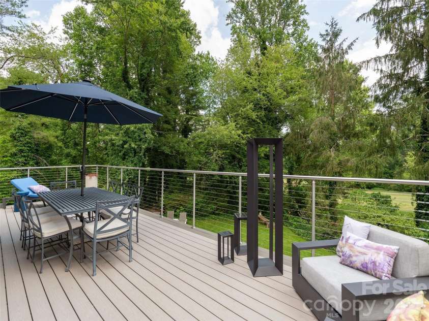 30 Fairway Drive, Etowah, NC 28729.  MLS# CAR4342625, YatesRealty ID 3360. Expansive deck