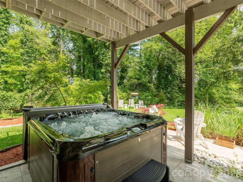 30 Fairway Drive, Etowah, NC 28729.  MLS# CAR4342625, YatesRealty ID 3360. Hot Tub