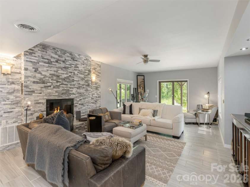 30 Fairway Drive, Etowah, NC 28729.  MLS# CAR4342625, YatesRealty ID 3360. Lower level family room