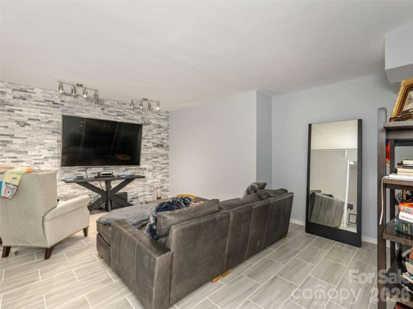 30 Fairway Drive, Etowah, NC 28729.  MLS# CAR4342625, YatesRealty ID 3360. Media room