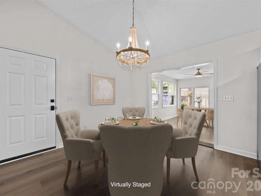 322 57th Street, Oak Island, NC 28465.  MLS# CAR4354711, YatesRealty ID 33606. Virtually Staged Dining Area