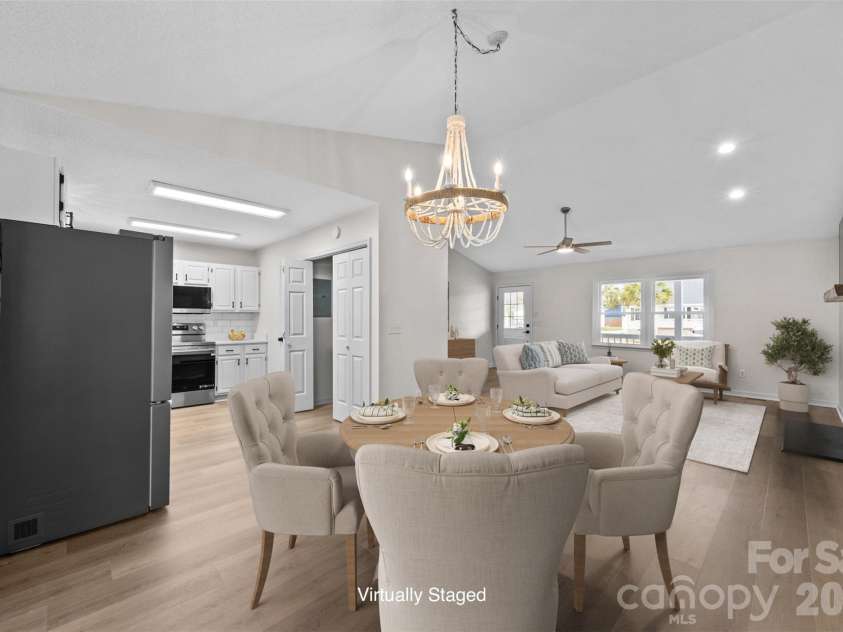 322 57th Street, Oak Island, NC 28465.  MLS# CAR4354711, YatesRealty ID 33606. Virtually Staged Dining Area