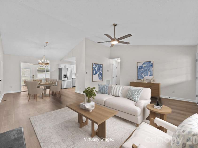 322 57th Street, Oak Island, NC 28465.  MLS# CAR4354711, YatesRealty ID 33606. Virtually Staged Living Room