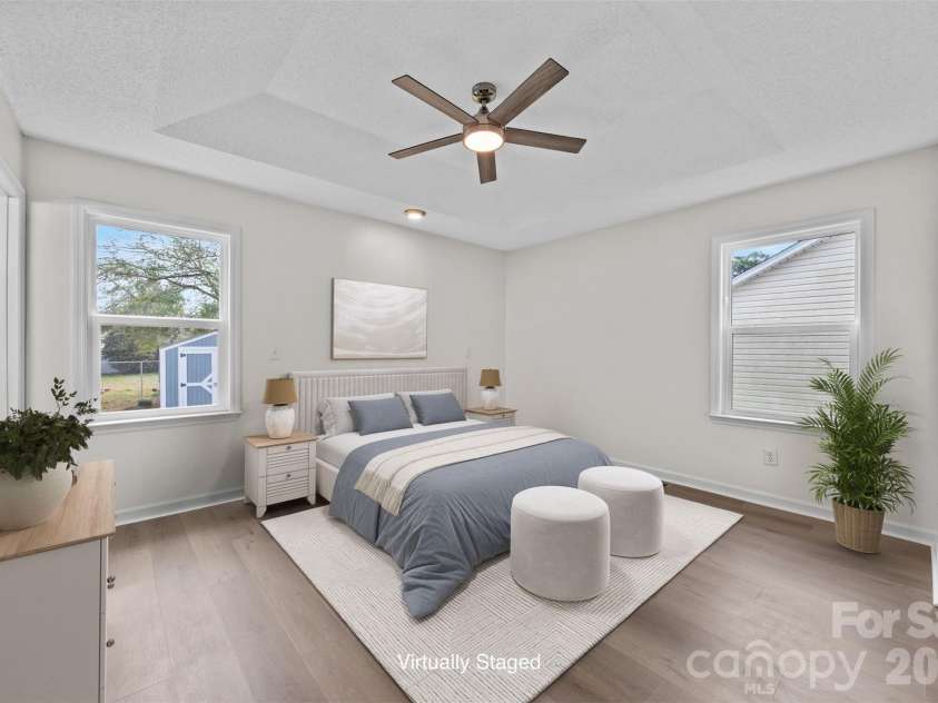 322 57th Street, Oak Island, NC 28465.  MLS# CAR4354711, YatesRealty ID 33606. Virtually Staged Primary Bedroom