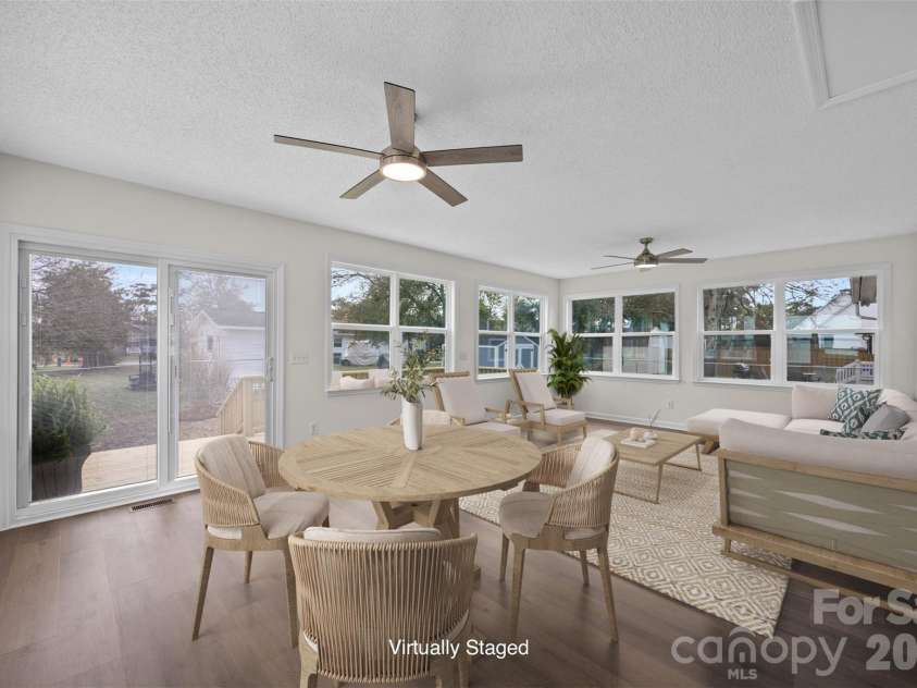 322 57th Street, Oak Island, NC 28465.  MLS# CAR4354711, YatesRealty ID 33606. Virtually Staged Sunroom