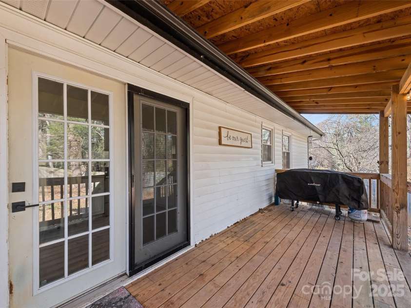 129 Willowbrook Road, Hendersonville, NC 28792.  MLS# CAR4324959, YatesRealty ID 33607. Back Covered Deck