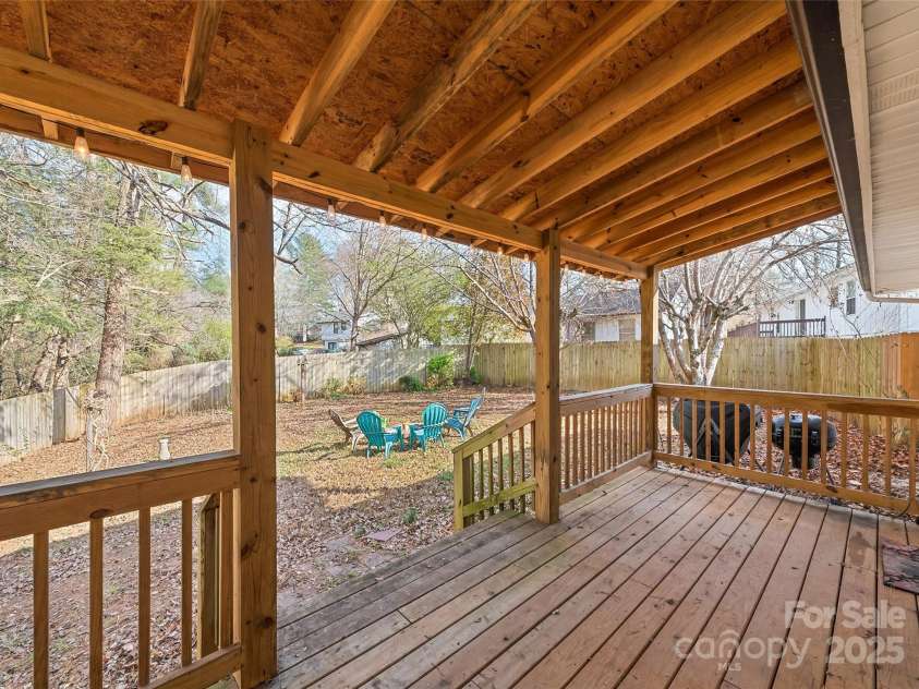 129 Willowbrook Road, Hendersonville, NC 28792.  MLS# CAR4324959, YatesRealty ID 33607. Covered Back Deck