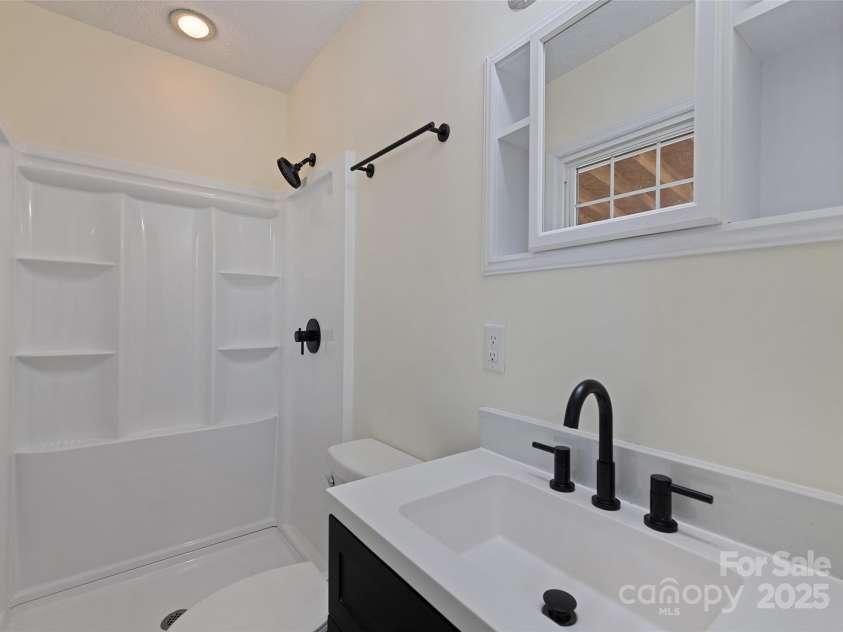 129 Willowbrook Road, Hendersonville, NC 28792.  MLS# CAR4324959, YatesRealty ID 33607. Primary Bathroom