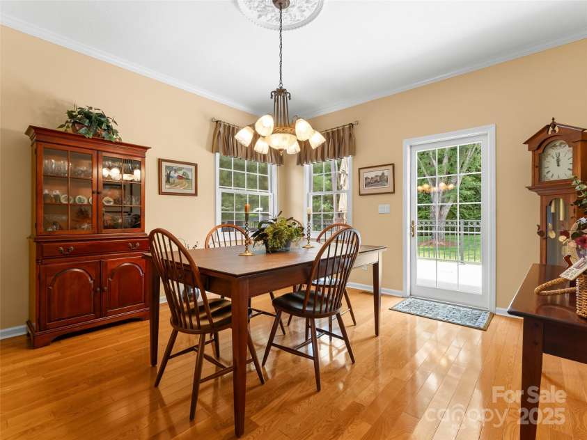 35 Beaumont Drive, Hendersonville, NC 28739.  MLS# CAR4293793, YatesRealty ID 33609. Dining Room w/ access to deck and yard