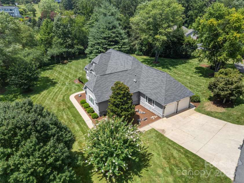 35 Beaumont Drive, Hendersonville, NC 28739.  MLS# CAR4293793, YatesRealty ID 33609. Drone shot of home