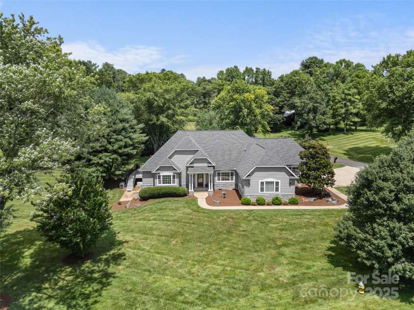 35 Beaumont Drive, Hendersonville, NC 28739.  MLS# CAR4293793, YatesRealty ID 33609. Drone shot of home