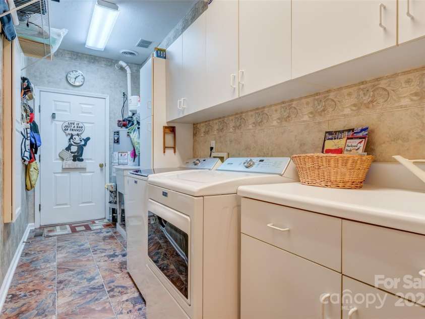 35 Beaumont Drive, Hendersonville, NC 28739.  MLS# CAR4293793, YatesRealty ID 33609. Laundry room in Mud Room