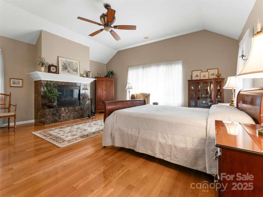 35 Beaumont Drive, Hendersonville, NC 28739.  MLS# CAR4293793, YatesRealty ID 33609. Primary Suite w/ fireplace