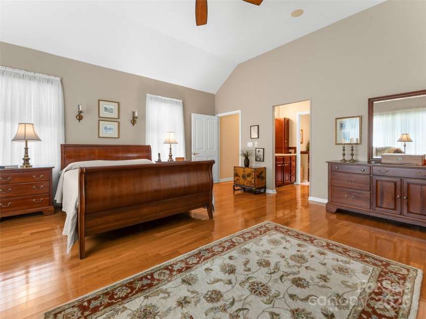 35 Beaumont Drive, Hendersonville, NC 28739.  MLS# CAR4293793, YatesRealty ID 33609. Primary Suite w/ walk in closet